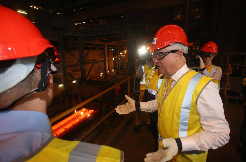 YEAR TO DO NOTHING: Then prime minister Malcolm Turnbull toured the Port Kembla steelworks with then energy minister Josh Frydenberg in November 2017.