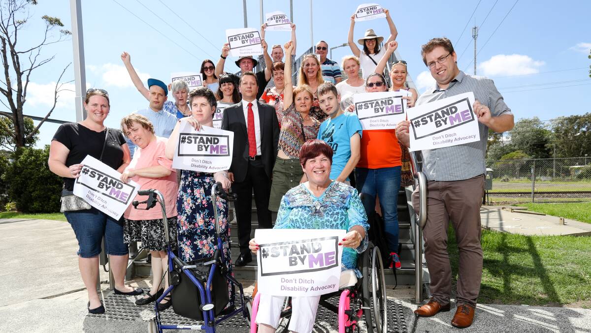 Stop the cuts: Illawarra residents with a disability, their carers and supporters at a protest at the inaccessible Unanderra railway station as part of the Stand by Me campaign run by the NSW Disability Advocacy Alliance. Picture: Adam McLean
