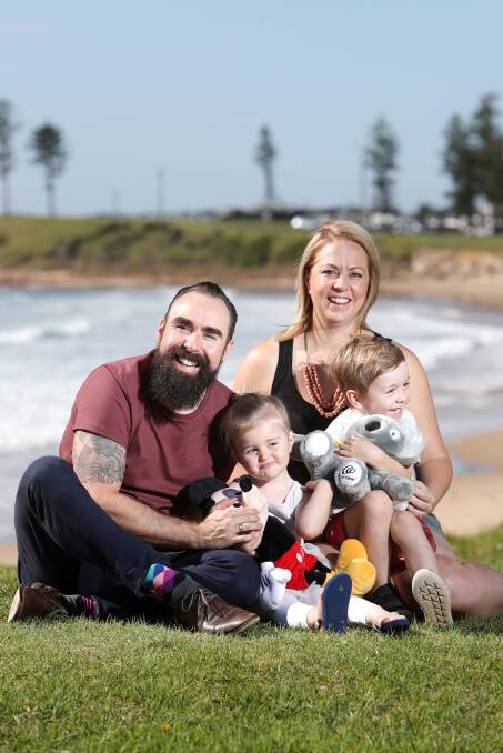 ​With her parents and brother Eli, 4. Picture: Adam McLean