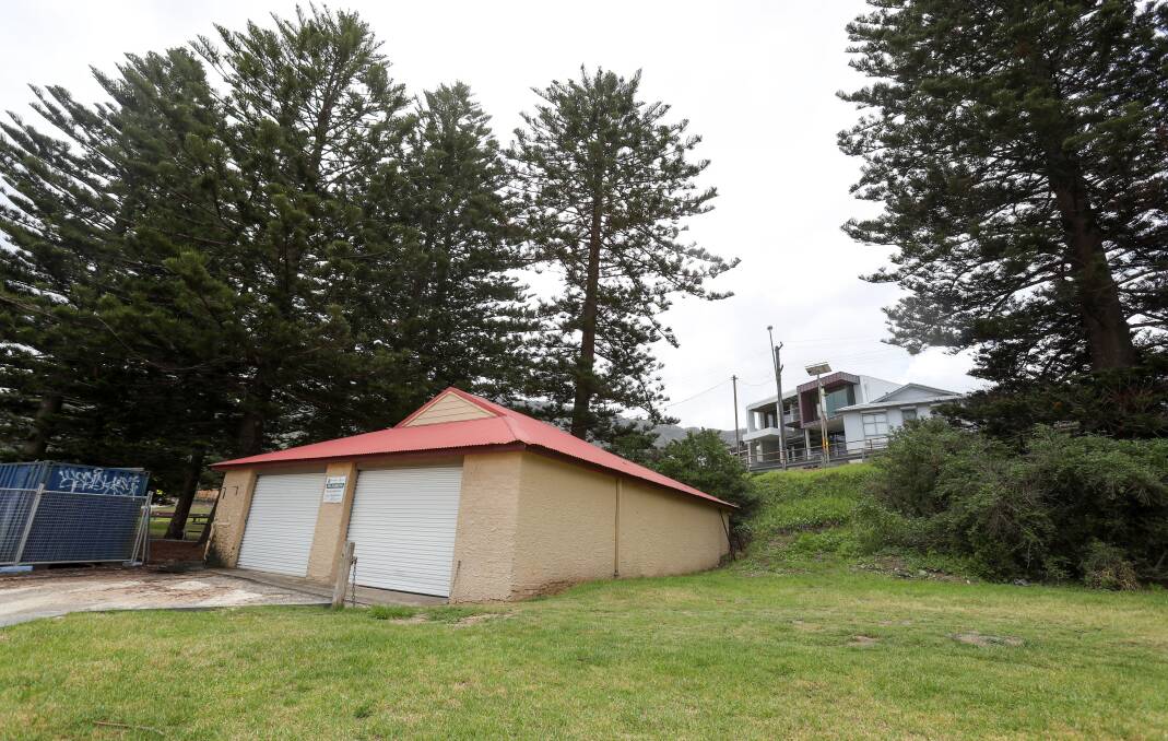 WORKSITE: The boat shed at the north end of Austinmer beach, which would be expanded out across the grassed area. Picture: ADAM McLEAN.
