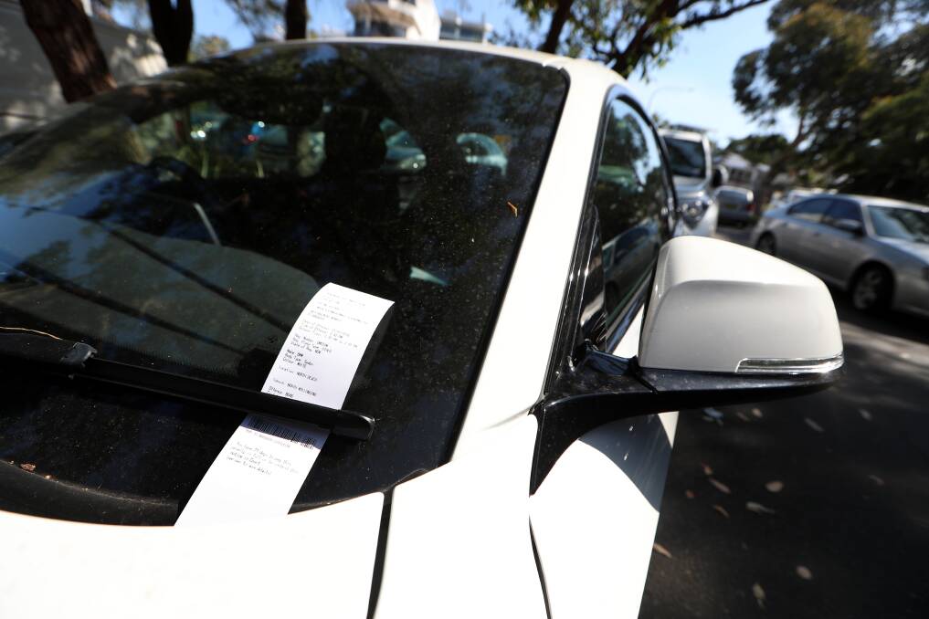 The dreaded ticket: The University of Wollongong will cut its parking fines; council will not.