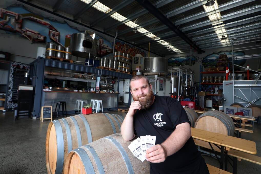 good deal: Matthew Wilson at the Bulli Brewing Company, which is accepting Return and Earn vouchers as legal tender for coffee, food and even beer. Picture: Sylvia Liber