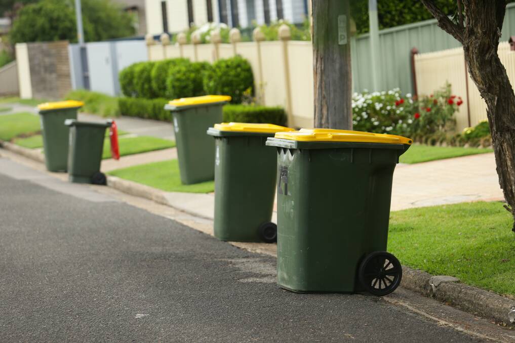 Bin it: Parking in front of someone's rubbish bin can cause friction in the suburbs. So residents respond by putting them on the road. Picture: Jonathan Carroll