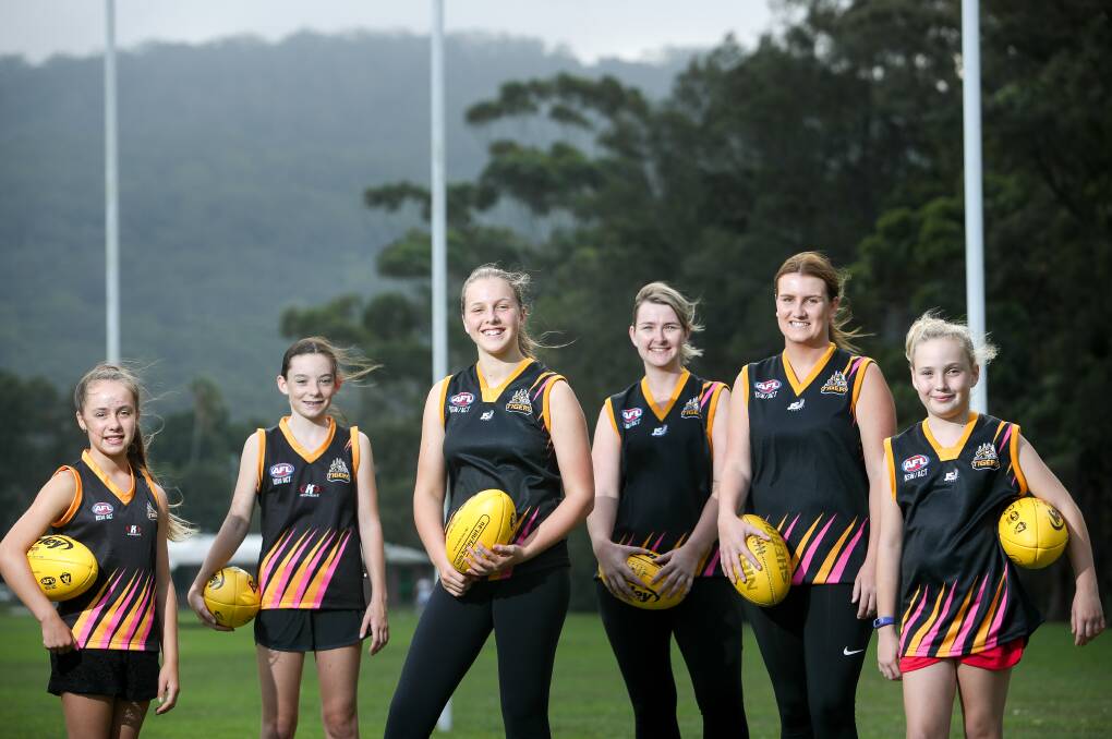 Tigerlabnd: Northern Districts girls and women's league players Caitlyn Hendry, Nara Rourke, Megan Ashford, Julie Langhorn, Ashlee Smith and Evie McLarnen at Hollymount Park. Picture: Adam McLean. 