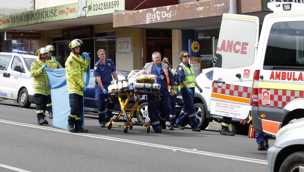 Road risk: Emergency services personnel often find themselves in dangerous situations when responding to accidents, such as a car crash on the Princes Hwy at Woonona late last month. Picture: Georgia Matts 