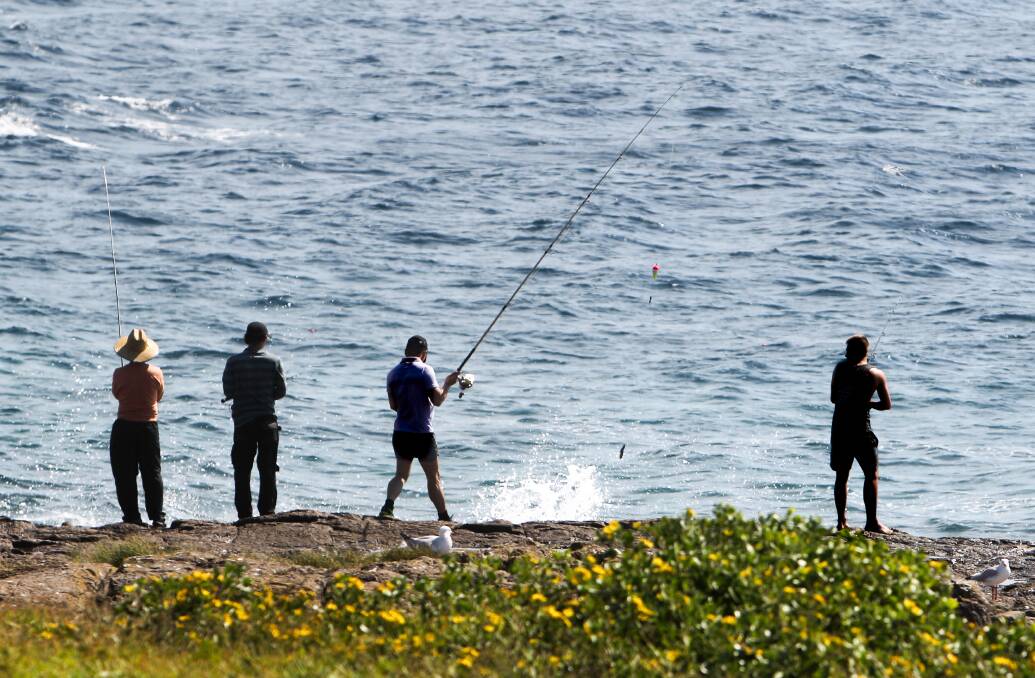 WAITING GAME: Fishing at Bass Point in April. Picture: Adam McLean