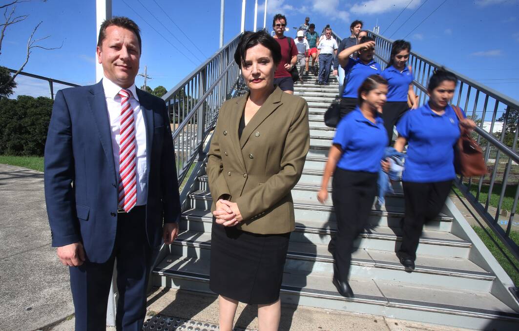 stair solution: Wollongong MP Paul Scully and Labor Transport spokeswoman Jodi McKay at Unanderra station. Picture: Robert Peet