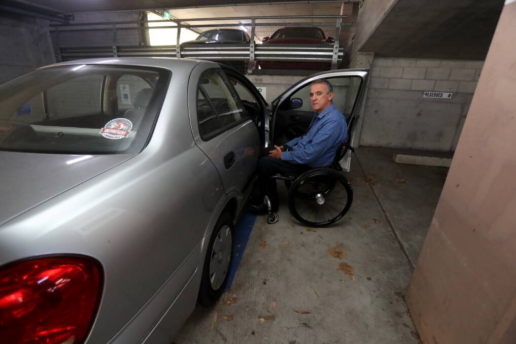 MAKE SPACE: Steve Petrolati needs the extra space in a disabled parking spot to get in and out of his wheelchair. When able-bodied drivers take a disabled space it means he has to turn around and go home. Picture: Robert Peet