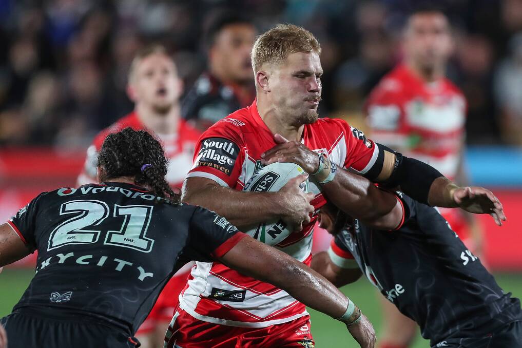 HARD STUFF: Dragons lock Jack de Belin throws himself into the Warriors defence in his side's 20-12 loss in Auckland last week. Picture: AAP