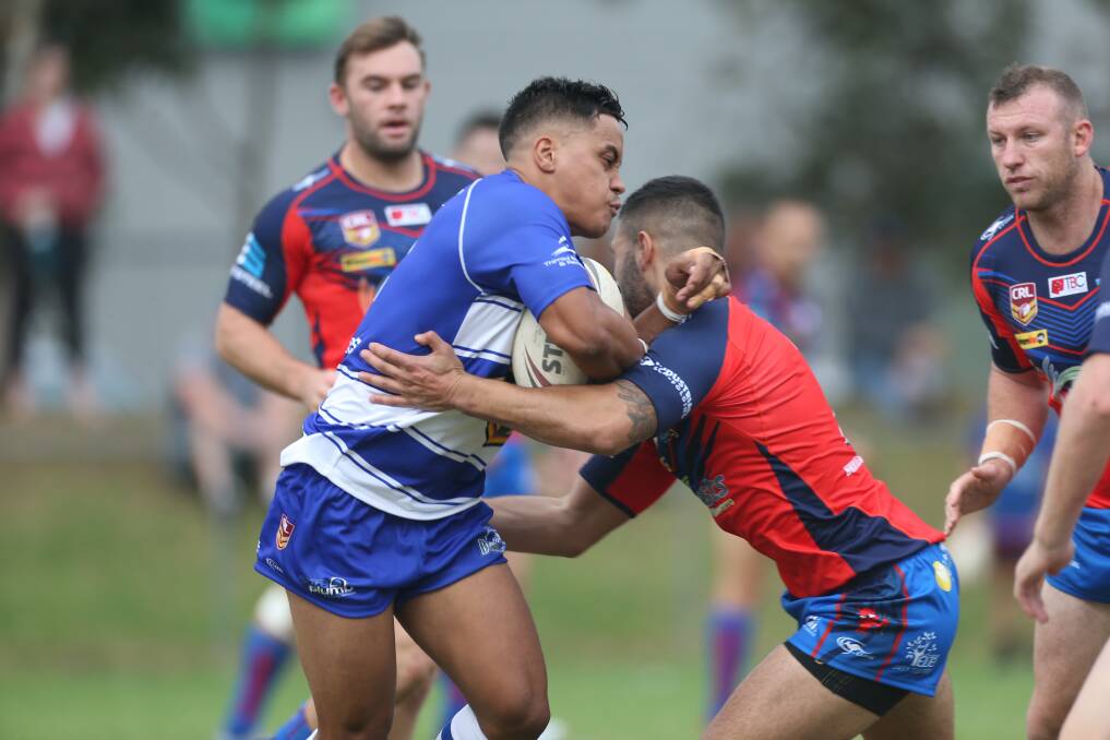 Cut loose: Thirroul centre Callum Tutauha tries to evade the Wests defence at Gibson Park on Saturday. Picture: Georgia Matts