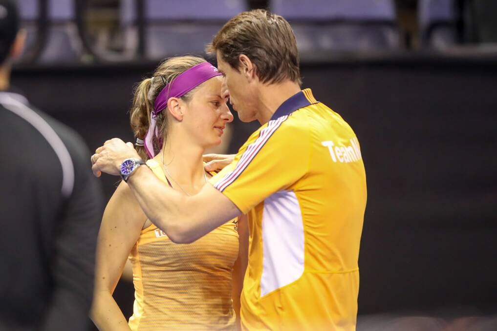 Effort: Netherlands player Quirine Lemoine and captain Paul Haarhuis during the Fed Cup loss. 