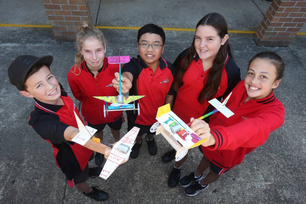 WINNERS: Logan Faff, Jane Griffiths, Dylan Nguyen, Emily McFarlane and Amity Mayo were among the winners of an Albion Park High School competition sponsored by the Wings Over Illawarra air show. Picture: ROBERT PEET.