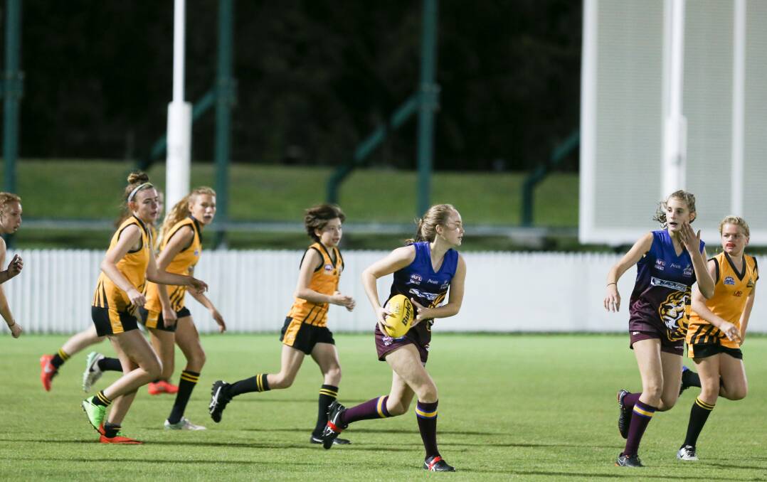 Friday night lights: The AFL South Coast Under 15 girls competition kicked off at North Dalton Park on Friday night. Picture: Georgia Matts.