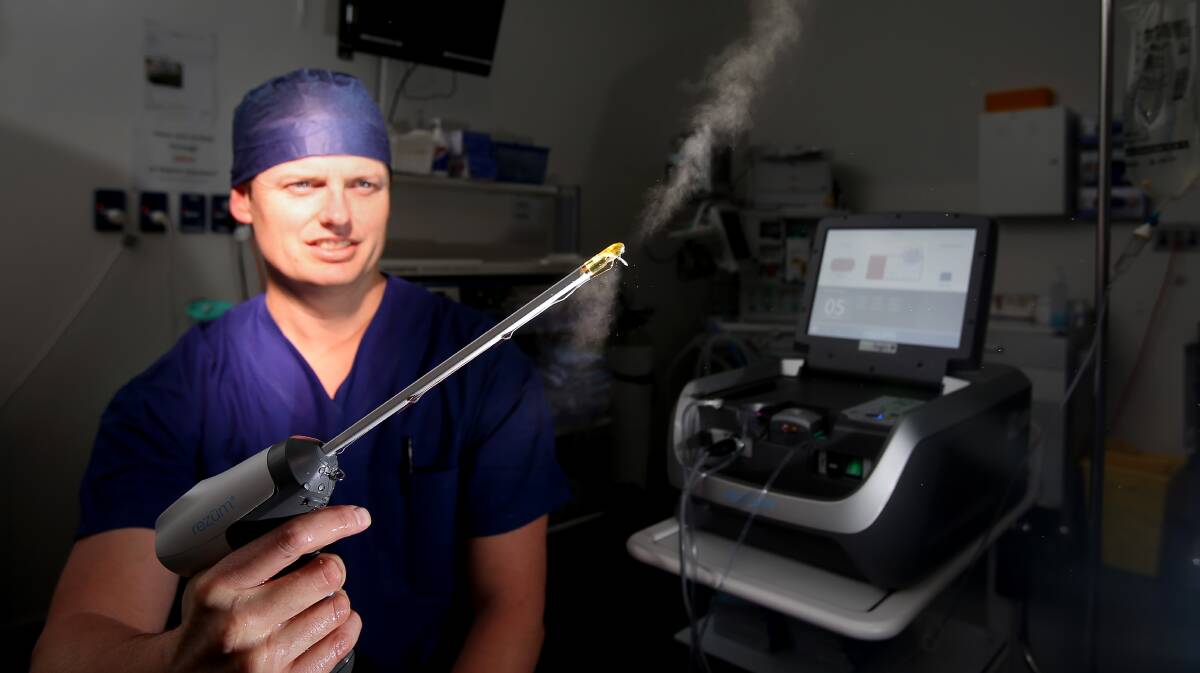 On target: Dr Matthew Threadgate at Shellharbour Private Hospital with the new device that uses water vapour to treat an enlarged prostate. Picture: Robert Peet