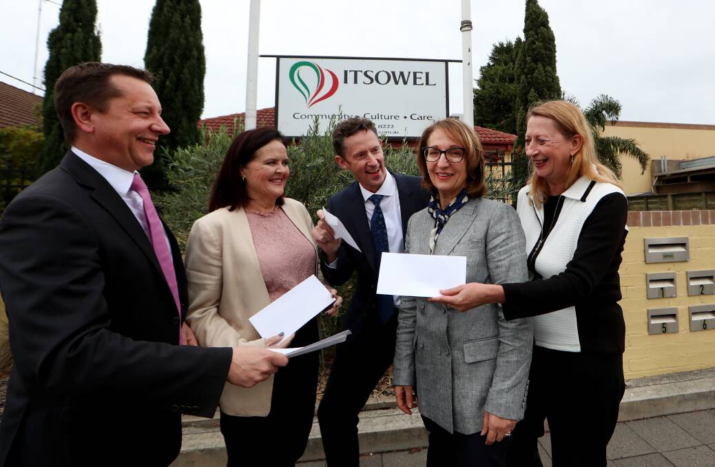STIMULUS: Illawarra MPs Paul Scully, Anna Watson, Stephen Jones, Sharon Bird and Ryan Park (missing) donated $1000 to Giovanna Cardmone. Picture: Sylvia Liber.