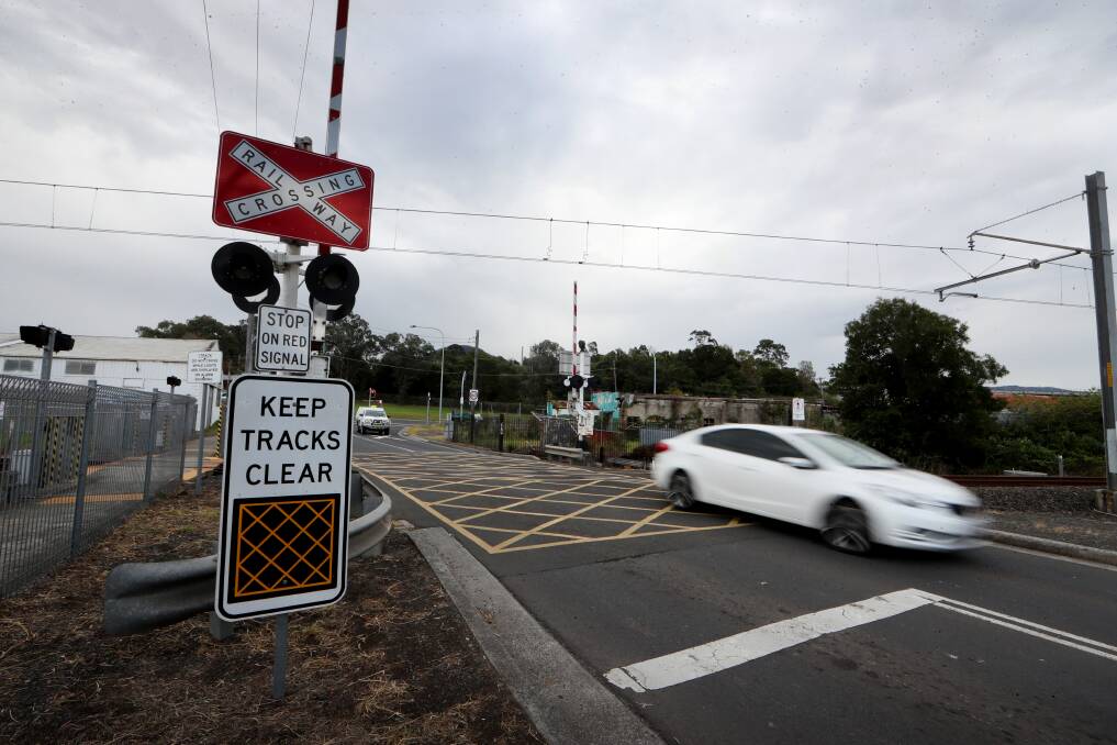 Safety first: The level crossing at Nolan Street Unanderra is one of 24 such rail crossings on the South Coast, which is almost twice as many as the entire Sydney rail network. Picture: Sylvia Liber