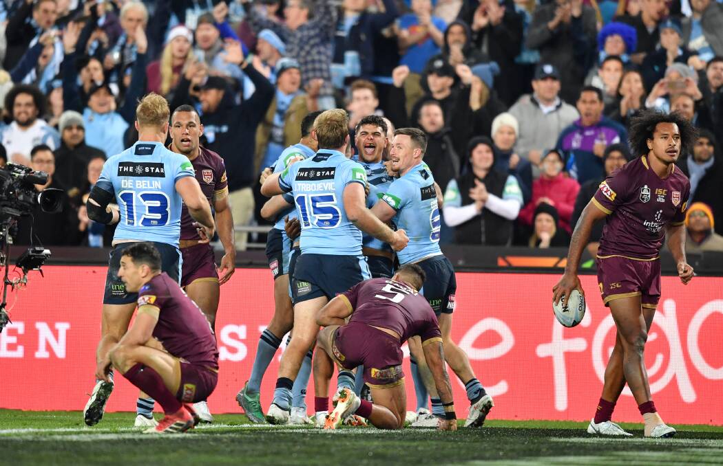 Blue bewdy: The Blues celebrate Latrell Mitchell's try. Picture: NRL Photos.