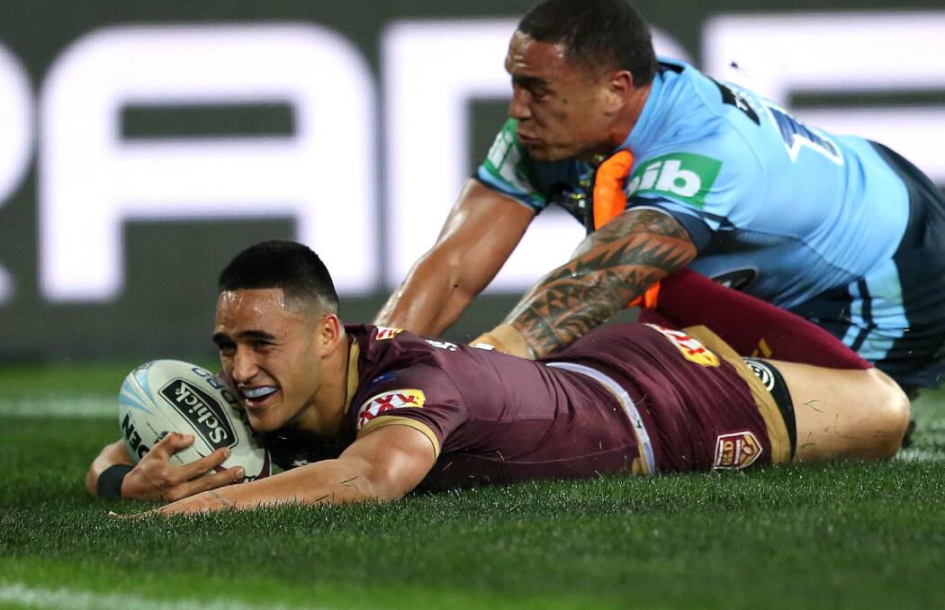 NICE: Valentine Holmes crosses for the Maroons. Picture: AAP 