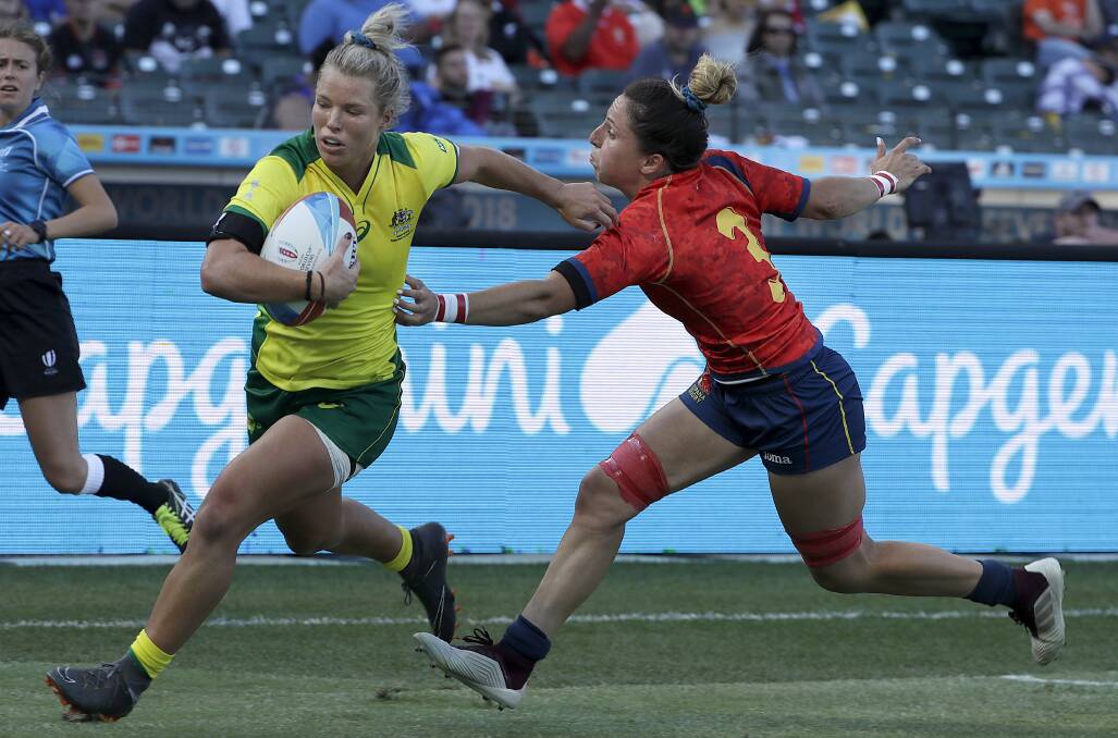 Back in the green and gold: Wollongong's Emma Tonegato will return from a shoulder injury at this weekend's Sydney Sevens. Picture: AP Photo/Jeff Chiu.