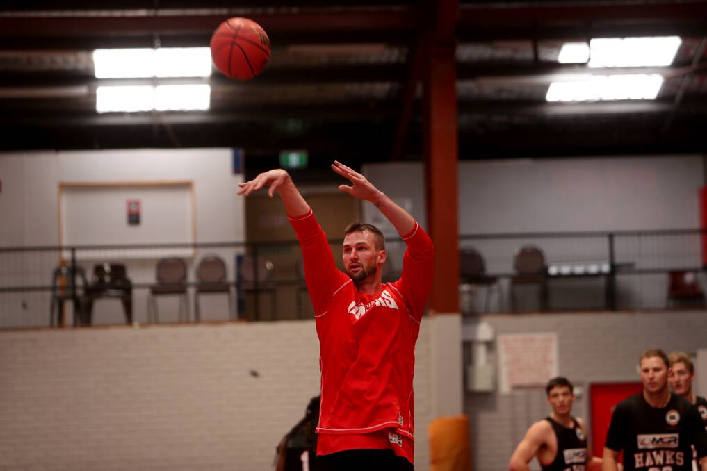 IN DOUBT: AJ Ogilvy was on limited duties at Hawks training on Wednesday. Picture: Sylvia Liber 