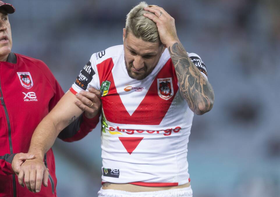 OUCH: Gareth Widdop leaves the field after dislocating his shoulder in the Dragons loss to the Eels on Saturday night.. Picture: AAP Image/Craig Golding