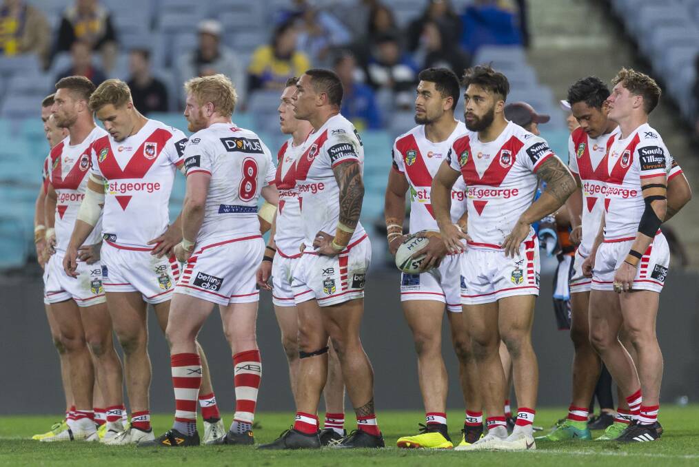 Dejected: The Dragons during their loss to the Eels. Picture: AAP