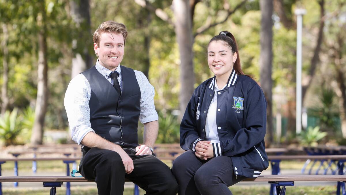 ENVIRONMENTAL PROJECT: Figtree High School science teacher Blake Thomas with student April Martins. Picture: Adam McLean