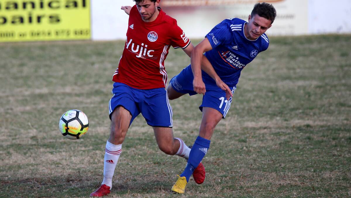 ONE STEP AWAY: Bulli's Harry Callaghan involved in a challenge in the club's draw with Albion Park .Picture: Sylvia Liber.
