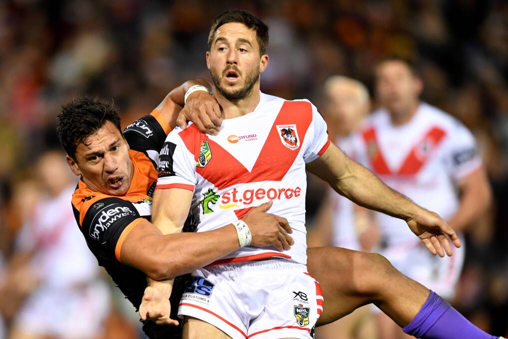 TOUGH NIGHT: Ben Hunt in action during his side's win over the Tigers. Picture: AAP Image
