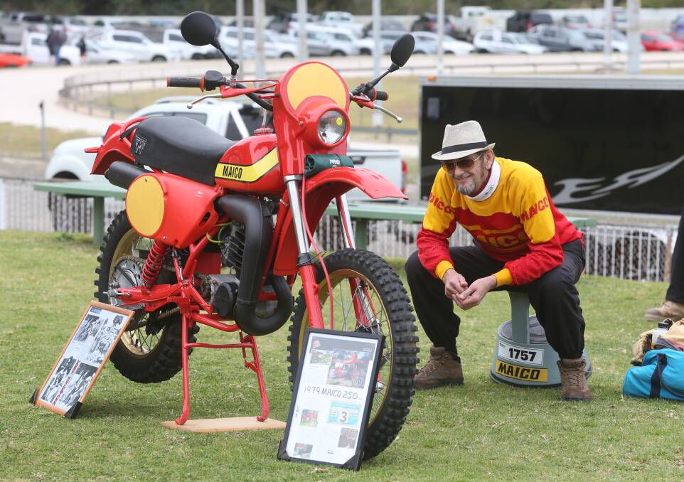 Dirt bike: David Trevor with his colourful red and yellow 1979 Maico shows the variety of two wheel machines on display. Pictures: Robert Peet.



