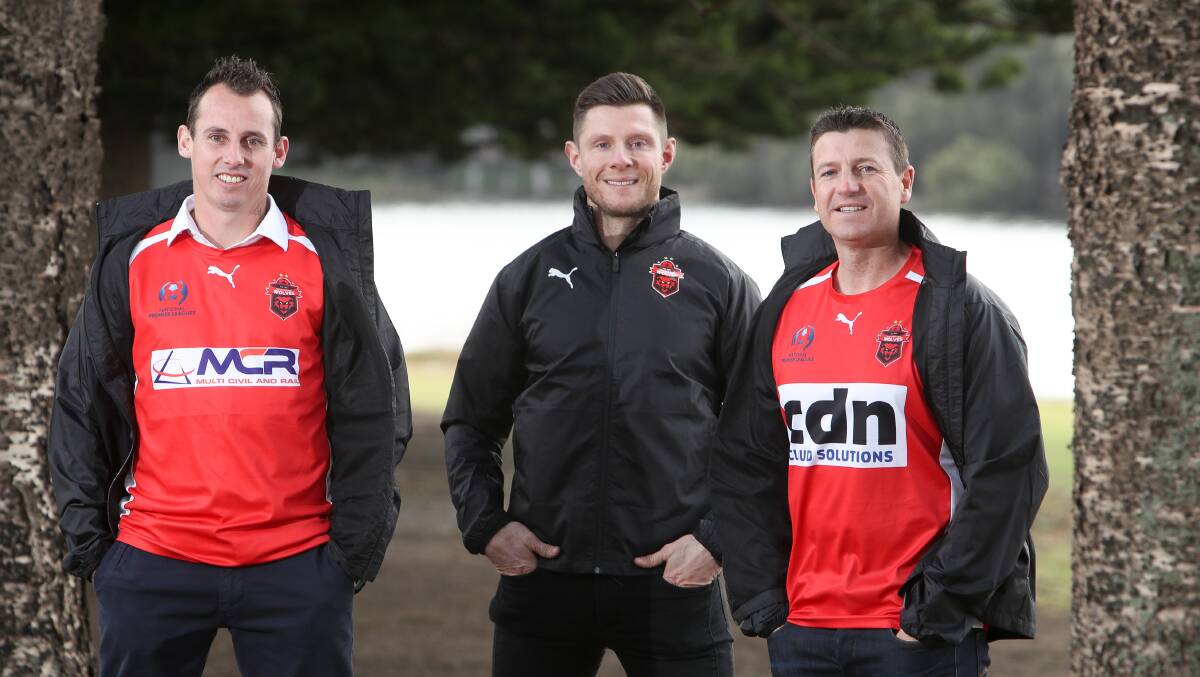 IN CHARGE: New Wolves coach Luke Wilkshire, with Grant Barlow and Michael Bridges in North Wollongong. Picture: ADAM McLEAN