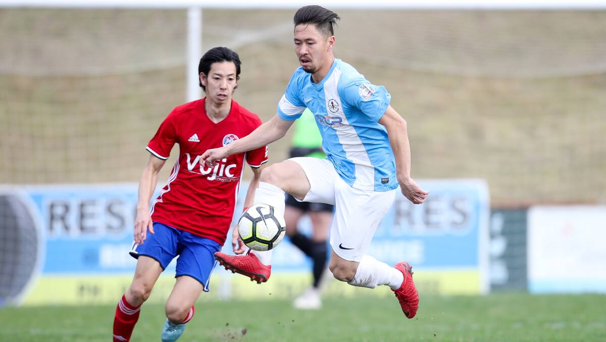 COMFORTABLE: Olympic's Kojiro Hori controls the ball in his side's win over Albion Park. Picture: ADAM McLEAN