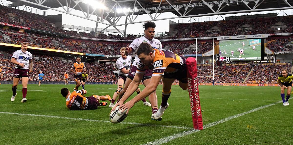 BIG DAY: Corey Oates scores his fourth try on Sunday. Picture: AAP Image