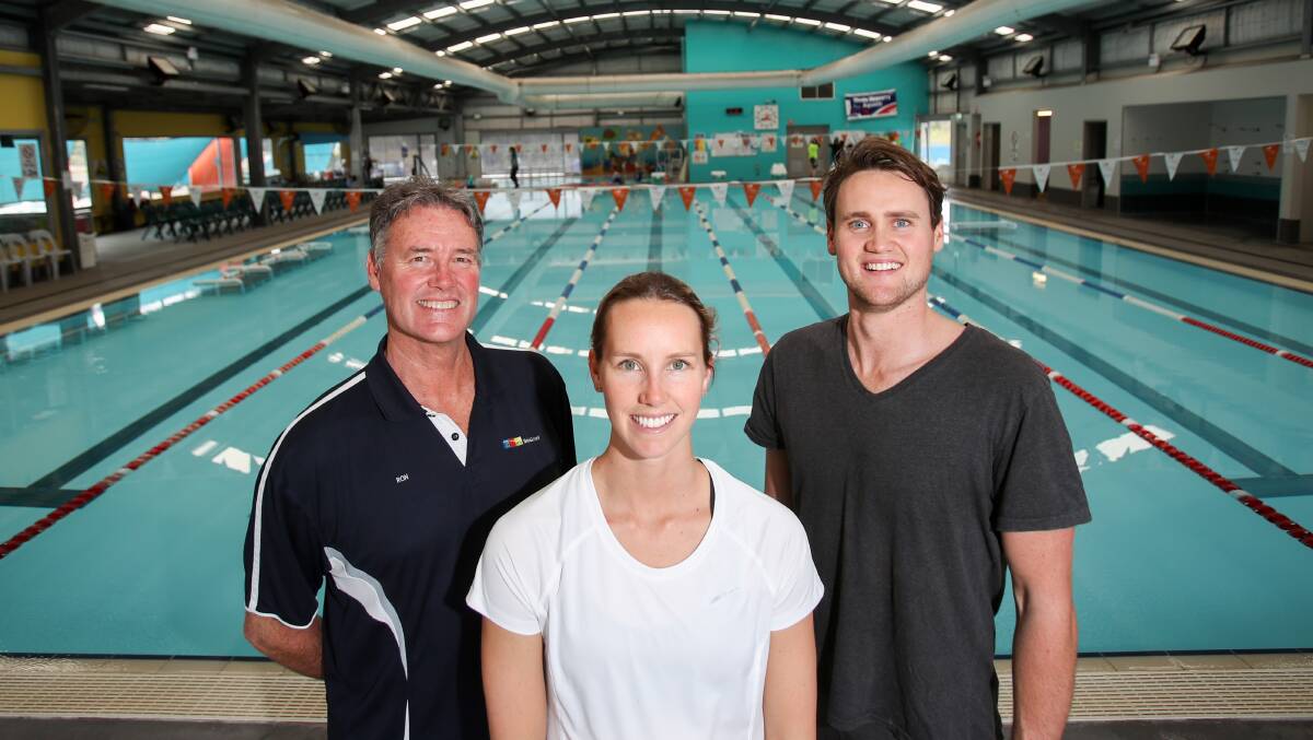 Family values: Emma and David McKeon will lead a series of swimming clinics to raise funds for bushfire victims. Picture: Adam McLean.