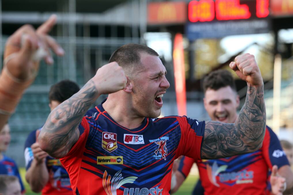 HOW GOOD: Wests back-rower Dylan Lauri celebrates his side's grand final victory over Thirroul on Sunday. Picture: Robert Peet