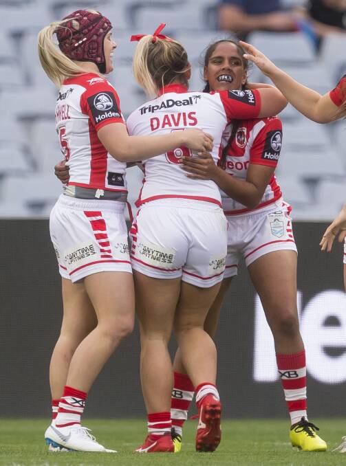 HOW GOOD: Shakiah Tungai celebrates her try in the Dragons win over the Warriors on Saturday. Picture: AAP 