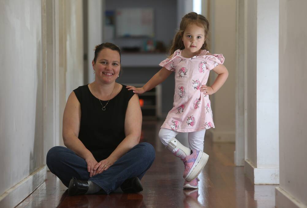 Long journey: Carley Jans with four-year-old Sophia who has to go back for further leg-lengthening surgery in the US next year, having grown quicker than anticipated. Picture: Robert Peet