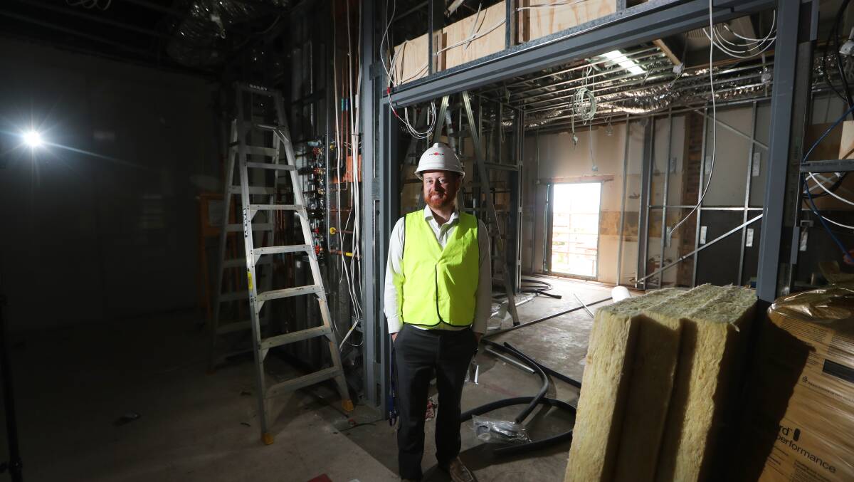 The CEO in the new integrated operating theatre under construction. Picture: Sylvia Liber