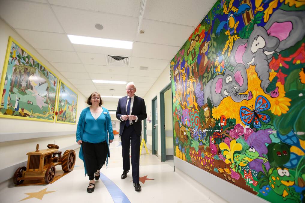 Grand plans: Dr Susie Piper, co-director for paediatrics, takes Kiama MP Gareth Ward on a tour through Wollongong Hospital's children's ward on Monday. Picture: Adam McLean
