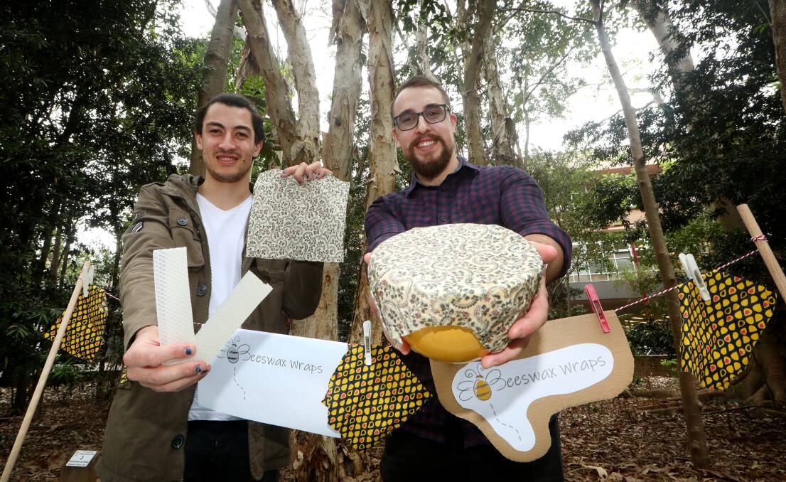 DO IT YOURSELF: Teaching students Callum Harris and Taylor Weule showed how to make beeswax wraps on Wednesday. Picture: Sylvia Liber.