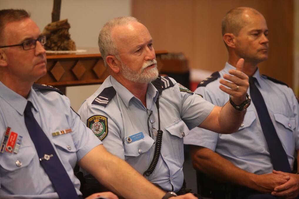 COMMUNITY FORUM: Senior Constable John Reilly (middle) says more people should call police when they see something suspicious or dangerous to help officers 'fill in the gaps' of crime. Picture: Robert Peet