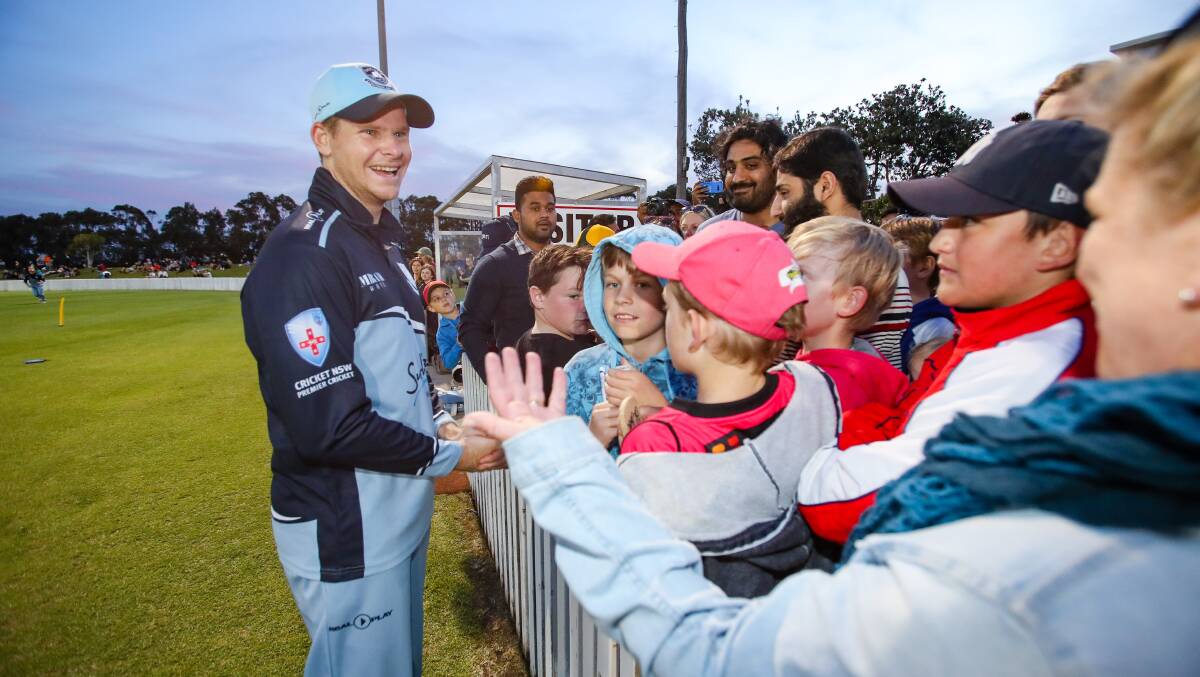 Sign here: Former Australian Test captain Steve Smith is all smiles at North Dalton Park. Picture: Adam McLean