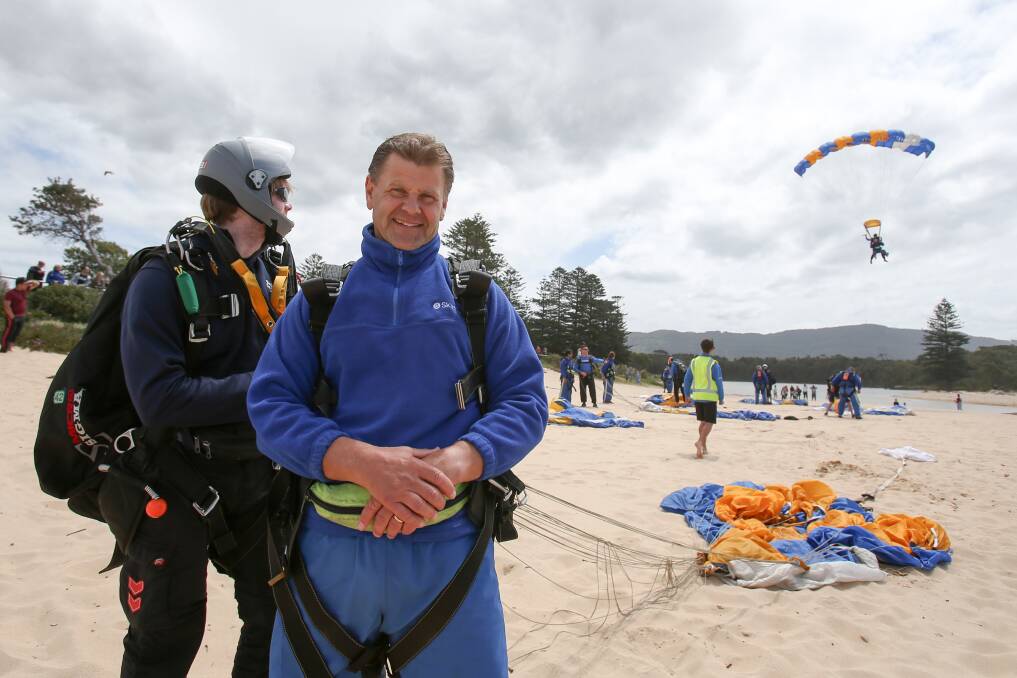 NSW Police Assistant Commissioner Mark Jones upon landing on North Wollongong beach on Sunday. Photo: Adam McLean