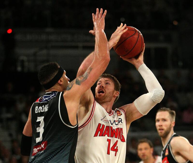 BATTLE: Star bigs Josh Boone (left) and Brian Conklin (right) are set to go to war again when Illawarra meet Melbourne on Thursday. Picture: AAP 