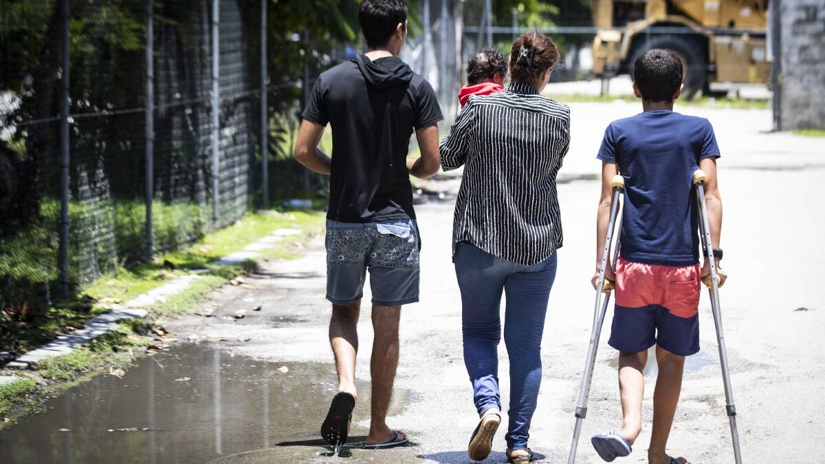 GET THEM OUT: Refugees pictured on Nauru. Australia aims to remove all asylum seeker children from Nauru within two months. Picture: Jason Oxenham