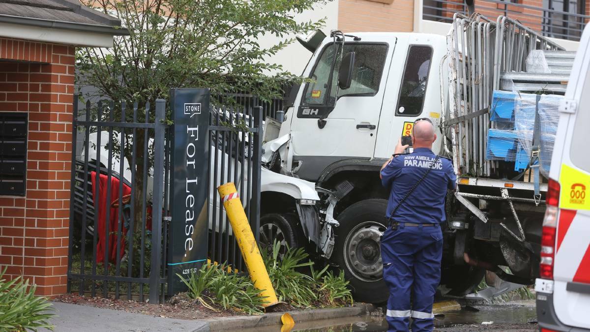 Report: The scene at Fairy Meadow McDonald's after a truck careered through the car park. A Roads and Maritime Services safety review of the area will not be made public.Picture: Robert Peet