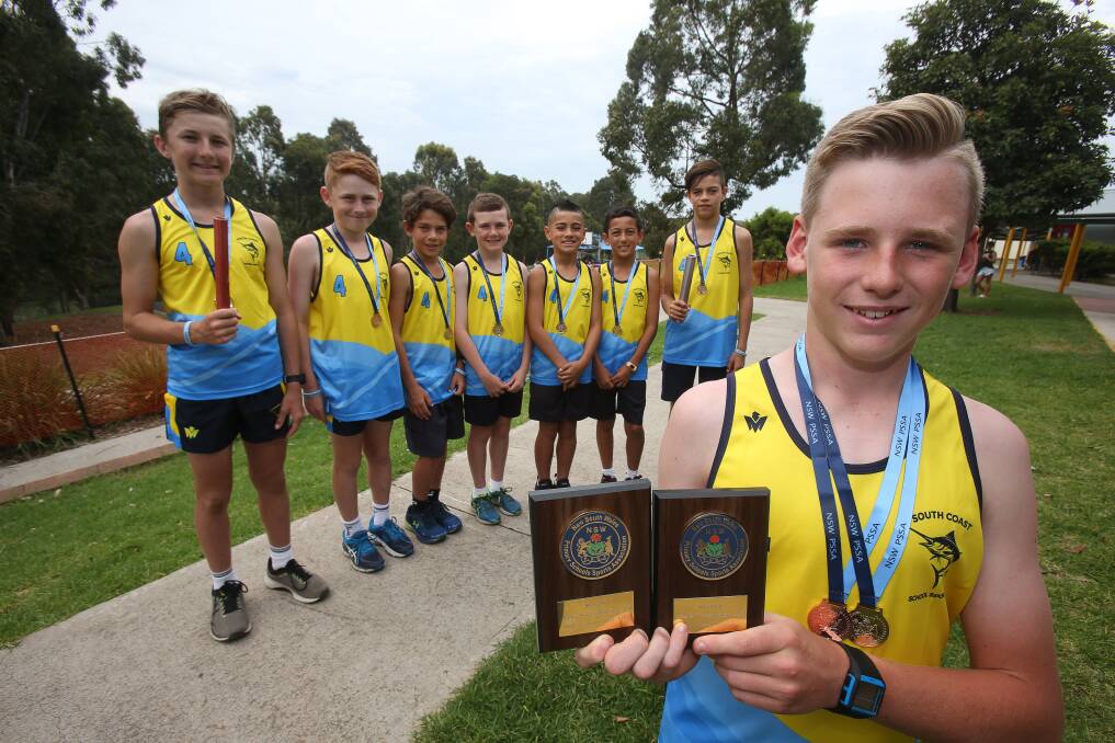 State champions: Shell Cove's junior and senior boys relay teams. Picture: Robert Peet. 