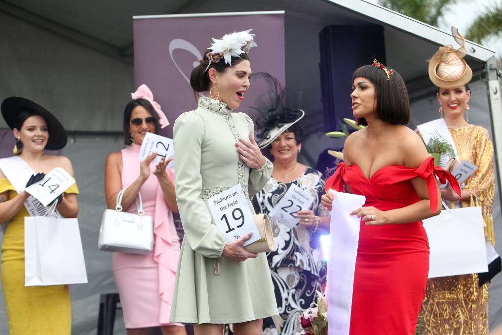 Erin Ketteringham in disbelief she was awarded Best Dressed Female at Fashions on the Field competition at Kembla Grange Racecourse on Tuesday. Picture: Adam McLean