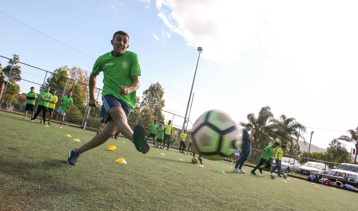 PARTICIPATE: Mohammad Alaaede playing in the FSC Refugee Soccer Program.