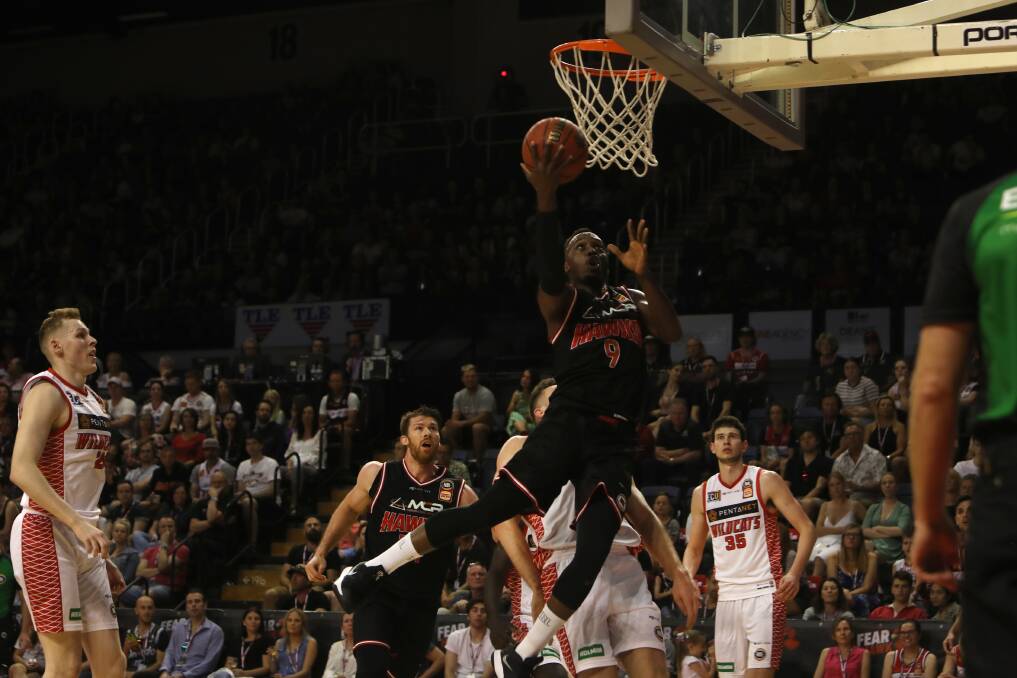 Rise: Hawks guard Cedric Jackson takes the ball to the basket against Perth Wildcats. Picture: Sylvia Liber